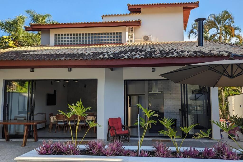 50m praia Cond pé na areia Alto padrao 4 suites Segur 24h Costa do sol Guaratuba Bertioga prox Riviera in Bertioga, Brasil