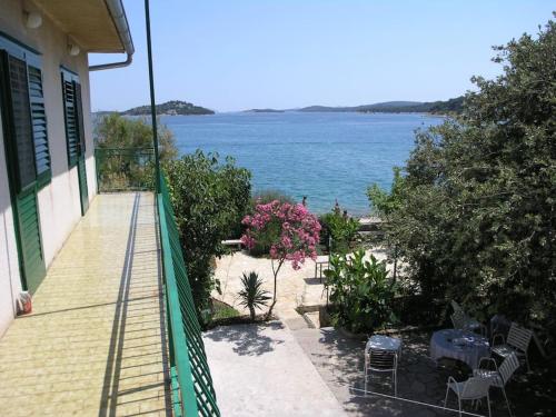 Beachfront House with Garden And Two Terraces — 4-Star Luxury Hotel in Tisno, Croatia