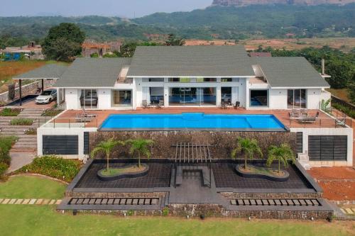 StayVista's Villa 107 at Canary Farms Pure Veg with Huge Lawn Pool and Home Theatre — 5-Star Luxury Hotel in Lonavla, India