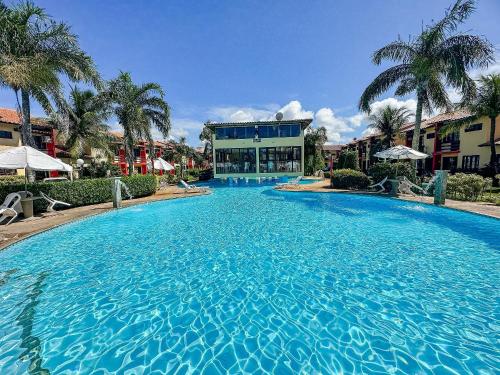 Casas com 2 ou 3 suítes no Residencial Jerusalem 2 frente mar em Coroa Vermelha condomíonio com piscina sauna e portaria 24hrs atravessou a rua está no mar. in Santa Cruz Cabralia, Brasil