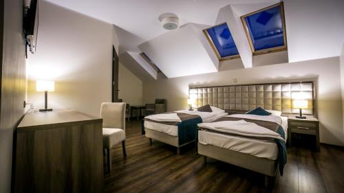 Zajazd Pod Borem - carbon neutral hotel in Pokoj