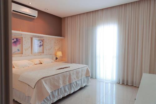 Apartamento alto padrA o com 3 suA tes sala 3 ambientes todos com ar ambientes novos e moderno. — 4-Star Luxury Hotel in Ubatuba, Brasil