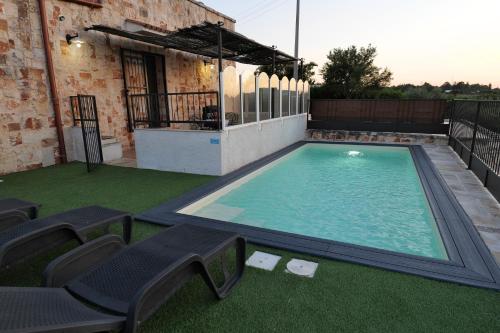 Il Borgodellequerce Casa Ulivi Piscina Privata — 4-Star Luxury Hotel in Martina Franca, Italy