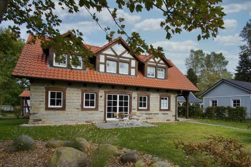 modernes Ferienhaus mit eigenem Garten und Terrasse Ferienhaus Bauernrose — 4-Star Luxury Hotel in Wiek, Germany