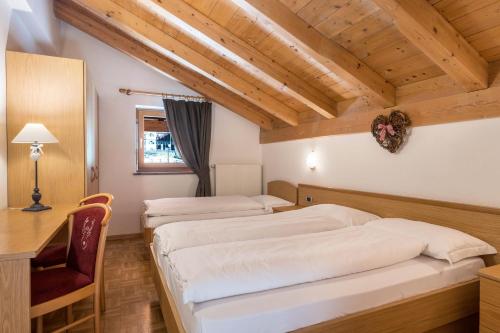 Villa Lory 5 — 4-Star Luxury Hotel in Canazei, Italy