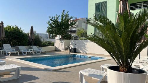 Villa Amaris Apartments with sea view & heated swimming pool at Čiovo — 4-Star Luxury Hotel in Trogir, Croatia