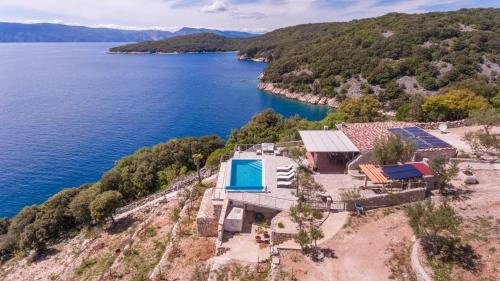 Villa Natura infinity pool magical nature and view complete privacy by Traveler tourist agency ID 2136 — 4-Star Luxury Hotel in Krk, Croatia