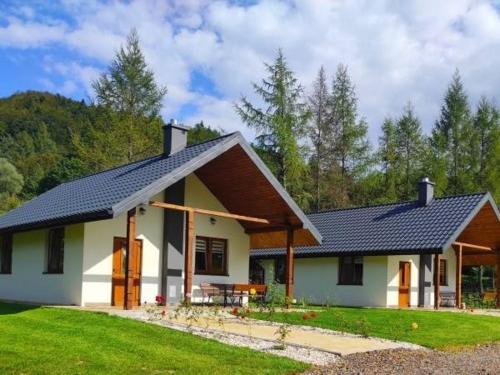 Domki Nad Rzeką Solinką Tomasz Pasławski in Polanczyk, Poland