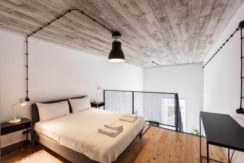 FLH Intendente Industrial Mezzanine with Balcony — 4-Star Luxury Hotel in Lisbon, Portugal