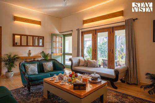 StayVista’s Fiddle Leaf Home Elegant Interiors Spacious Lawn & Inviting Balcony