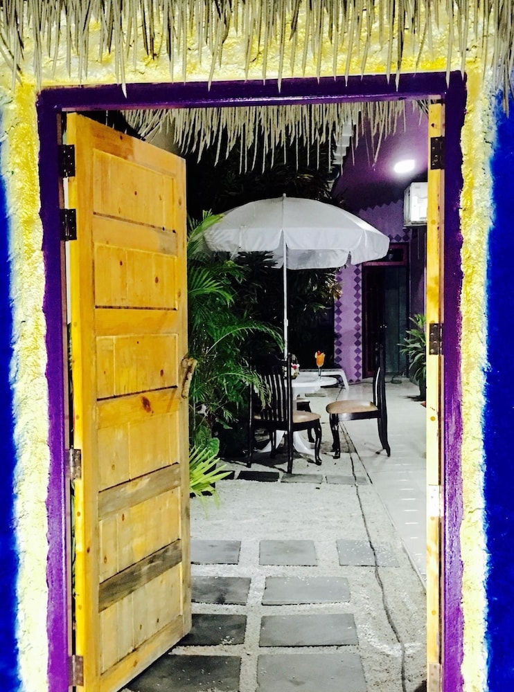 Sunset Holidays - carbon neutral hotel in Unknown City