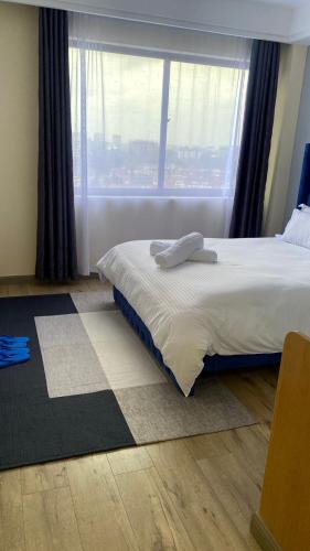 The elegant cozy apartment with amazing city views heated swimming pool well equipped gym child play area and free parking space