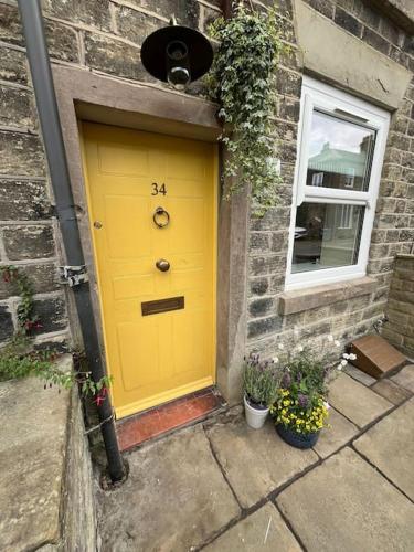 The Yellow Door To the Peaks in Macclesfield, United Kingdom
