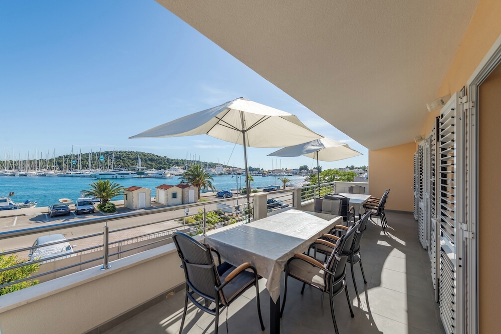 Seafront apartments Marija with terrace and mooring — 4-Star Luxury Hotel in Rogoznica, Croatia
