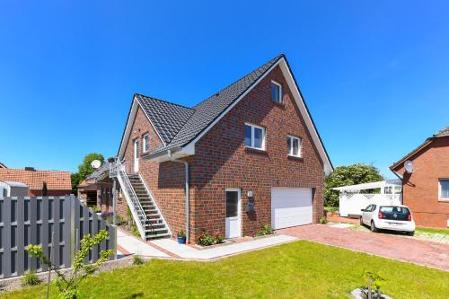 Ferienwohnung im Haus Hafenlicht — 4-Star Luxury Hotel in Neuharlingersiel, Germany