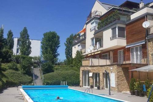 Peppy Apartment & Pool — 4-Star Luxury Hotel in Balatonfured, Hungary