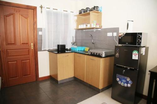 Ln Elegantly Furnished Mvuli Apartment
