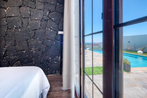 Villa Macher Piscina y Bar piscina — 4-Star Luxury Hotel in Tias, Spain