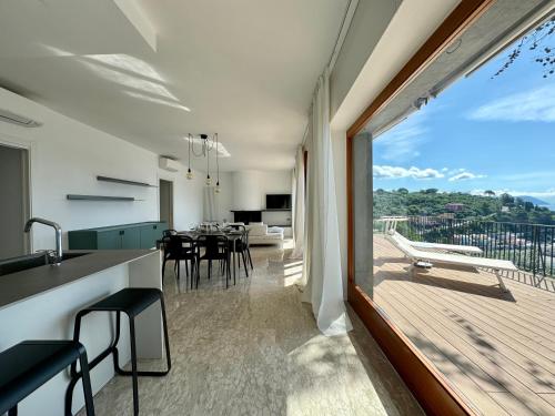 Modern and Elegant apartment with a spacious sea view terrace overlooking Palmaria Island Bright designer interiors Fully equipped Up to 6 guests Private parking Aircon All the comforts for a perfect stay — 4-Star Luxury Hotel in Portovenere, Italy