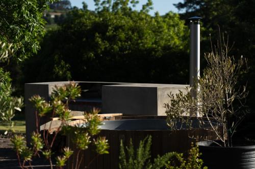 Avemore Vineyard View wood fired hot tub and full power back up — 4-Star Luxury Hotel in Cape Town, South Africa