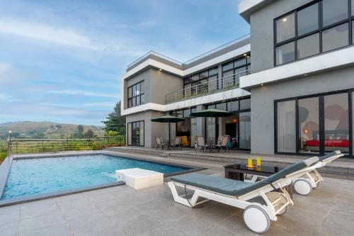 Casa Boho by StayVista Contemporary design Farm view Swimming pool & Indoor games for a chic retreat — 5-Star Luxury Hotel in Nashik, India