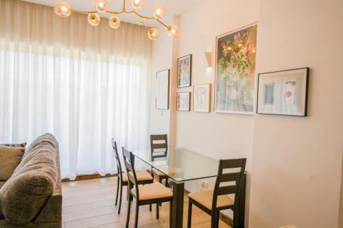 Riverbank One Bedroom Apartment Swimming pool gym workspace DB Space Living
