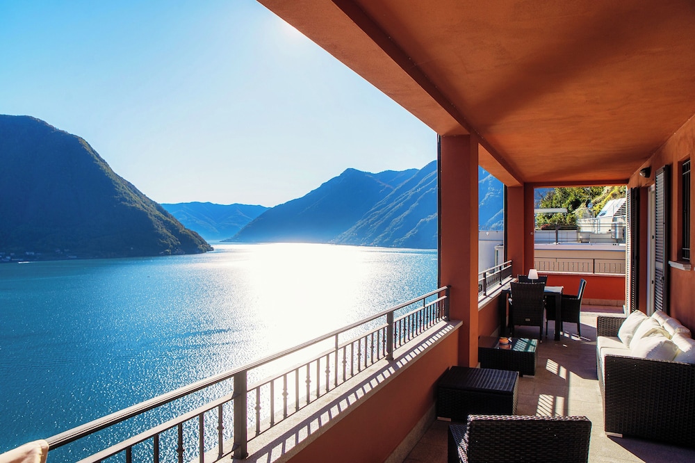 Rosso Sunset by MyHomeInComo — 4-Star Luxury Hotel in Colonno, Italy
