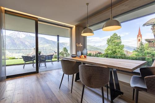 Enjoy Dolomites Apartment — 4-Star Luxury Hotel in Dobbiaco, Italy