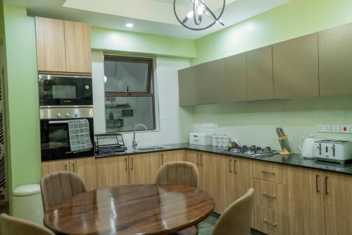 Stylish Nairobi Getaway 2BR Apartment PoolTable