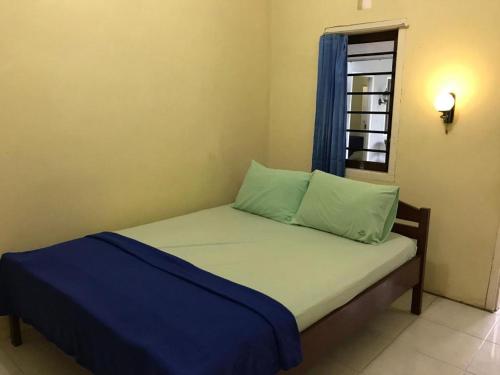 Hotel O Wisma Pinggir - carbon neutral hotel in Unknown City