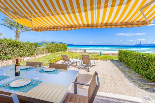 Beachfront Villa Socias Playa by Sealand Villas — 4-Star Luxury Hotel in Muro, Spain