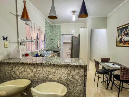 R17 Churrasqueira Privativa pet friendly in Guaruja, Brasil