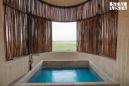 StayVista’s The Sweet Life 5BHK Luxury Farm stay with Private Pool in Sohna