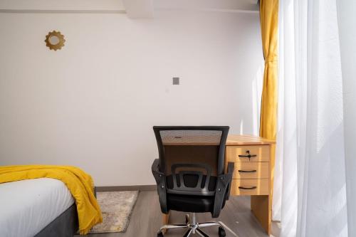 Nivla Executive Cozy haven with gym and Balcony