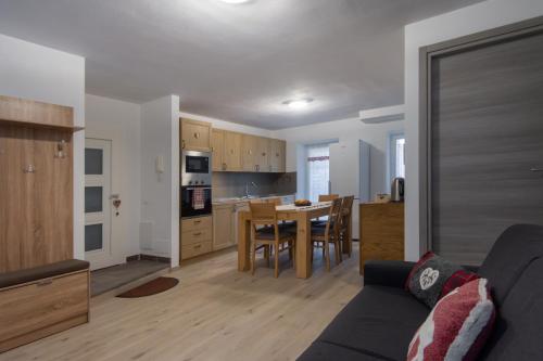 DolomiApartments Appartamento Avisio — 4-Star Luxury Hotel in Predazzo, Italy