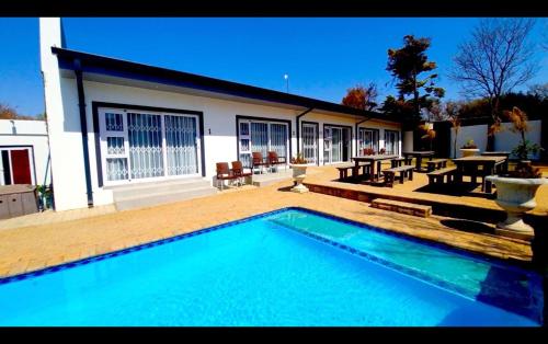Riverbank Villas Guesthouse — 4-Star Luxury Hotel in Potchefstroom, South Africa
