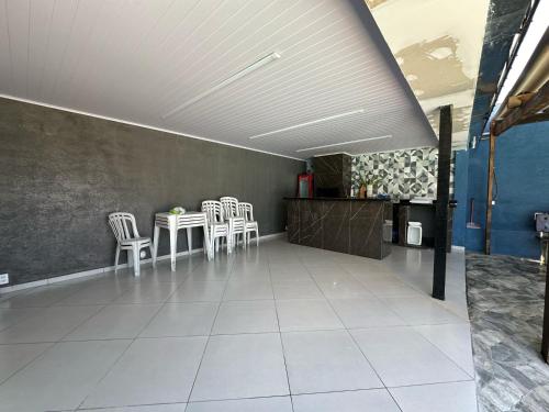 Espaço com piscina - carbon neutral hotel in Suzano