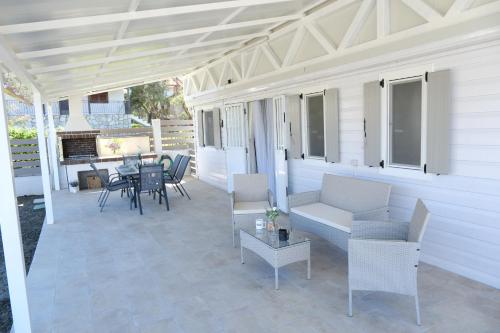 Sunset Beach House — 4-Star Luxury Hotel in None, Greece