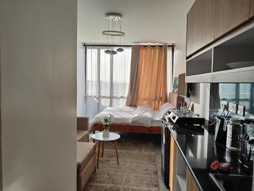 Fedha A modern furnished Studio Apartment near JKIA and SGR free WIFI Parking