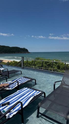 Suíte Familia com Hidro Frente Mar Blue Sea in Itapema, Brasil
