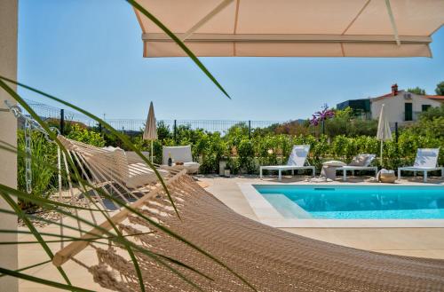 Marula holiday home with heated pool — 4-Star Luxury Hotel in Marina, Croatia