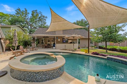 Pool Hot Tub Parking EV Charger 4BR 3BA N Austin Getaway by Austin Vacay in Austin, United States