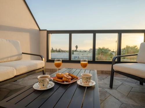Apartamentos Rosa VelA zquez — 4-Star Luxury Hotel in Merida, Spain