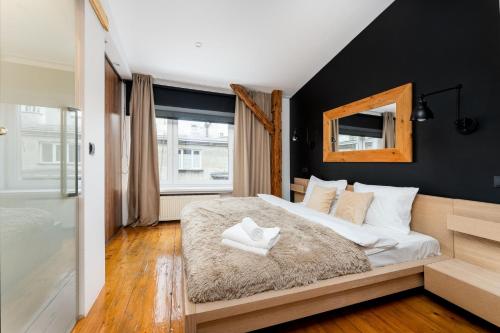 Old Town Wooden Loft Apartment by BookingHost — 4-Star Luxury Hotel in Krakow, Poland