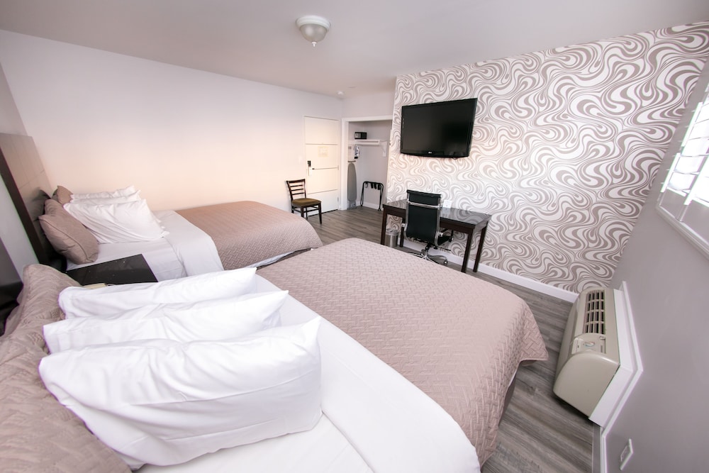 Metropolitan Inn & Suites - photo 17