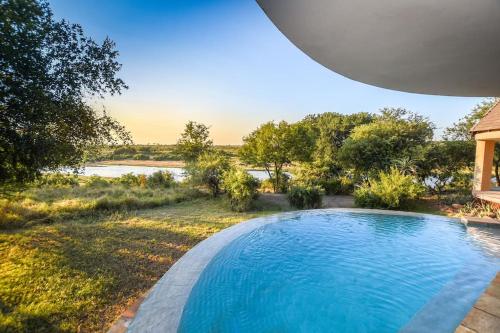 Impangele River Lodge — 4-Star Luxury Hotel in Hectorspruit, South Africa