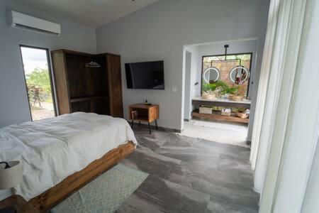 Modern Villa Overlooking Macal River Valley — 4-Star Luxury Hotel in Benque Viejo El Carmen, Belize
