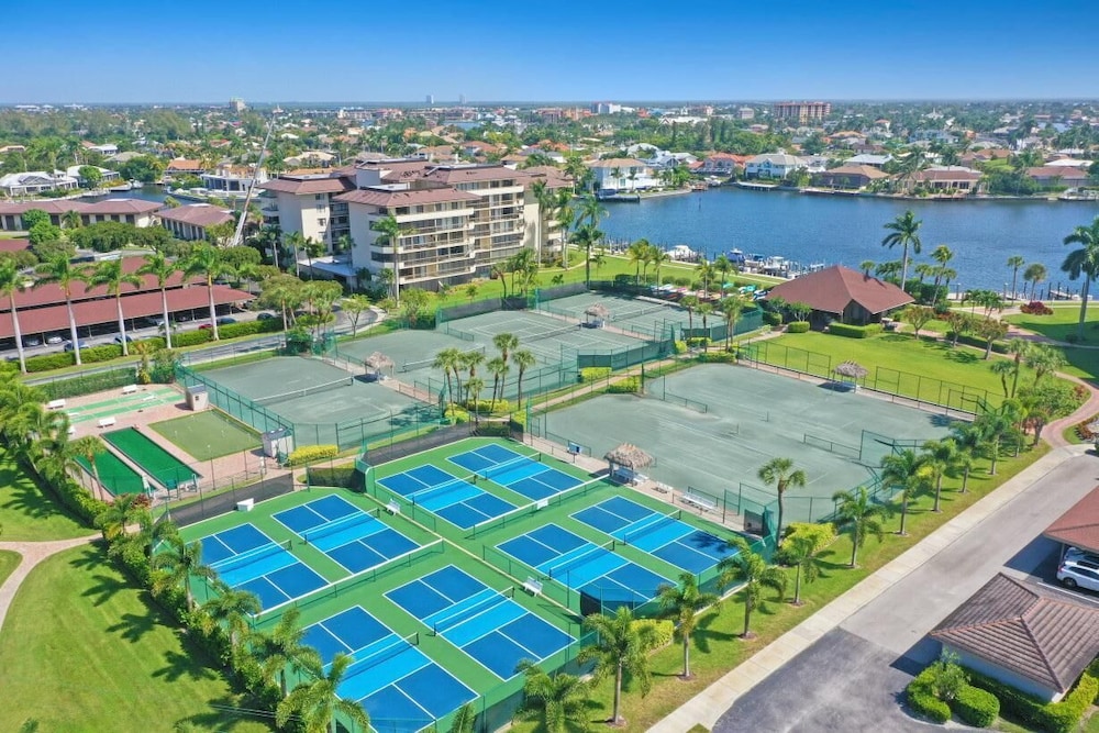 Beachfront condo in resort style community with pool - photo 34