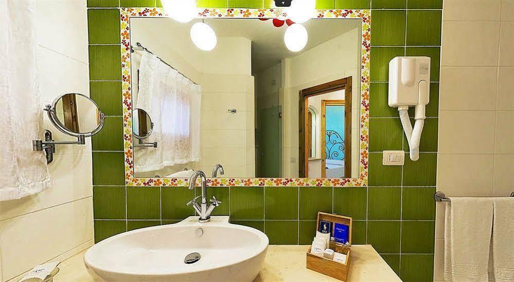 Residence Cala Di Falco Cannigione — 4-Star Luxury Hotel in Cannigione, Italy