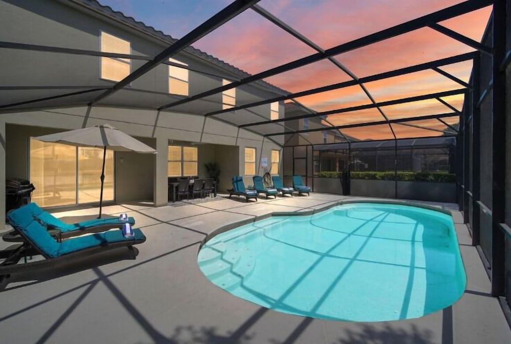 Stunning Lake View from South Facing Extended Pool Deck with Games Room on Gated Solterra Resort — 4-Star Luxury Hotel in Davenport, United States